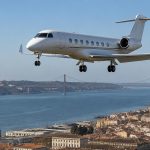 Multi-Stop Private Jet Itineraries: Lisbon, Porto and the Algarve in One Trip Private jet approaching Lisbon over the Tagus
